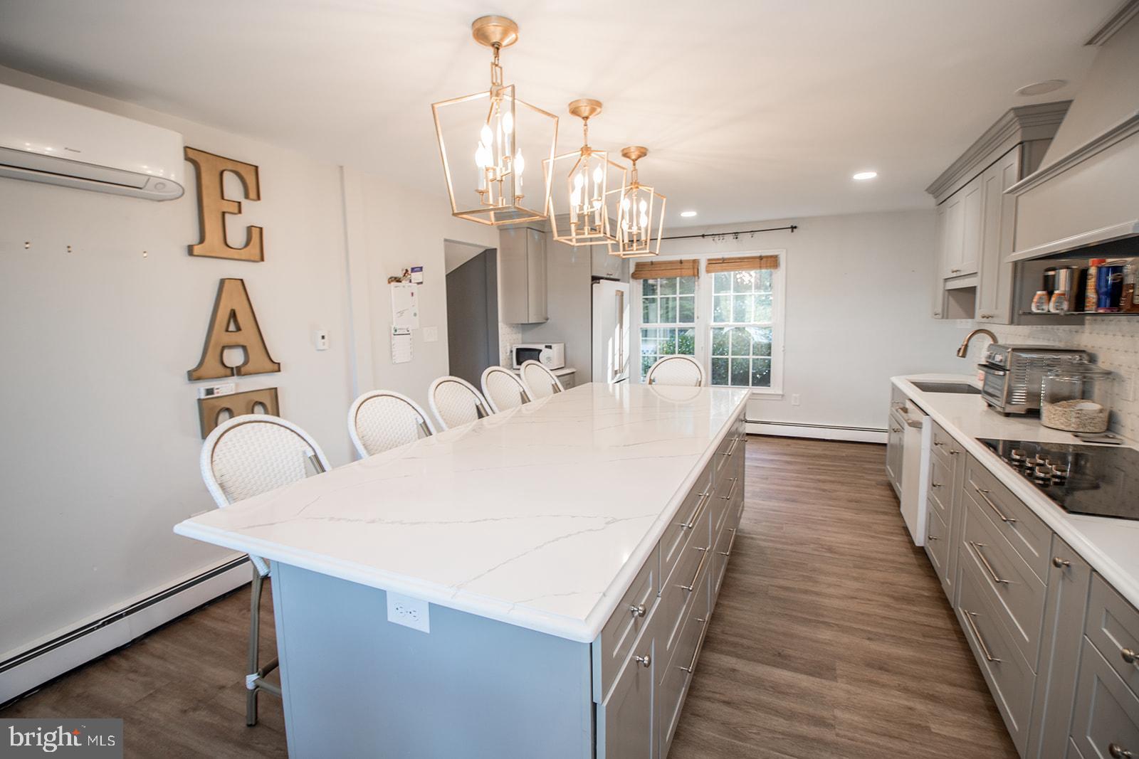 8120 Chapel Point Road Port Tobacco, MD 20677 - Photo 10 of 95 a large white kitchen with sink and dishwasher