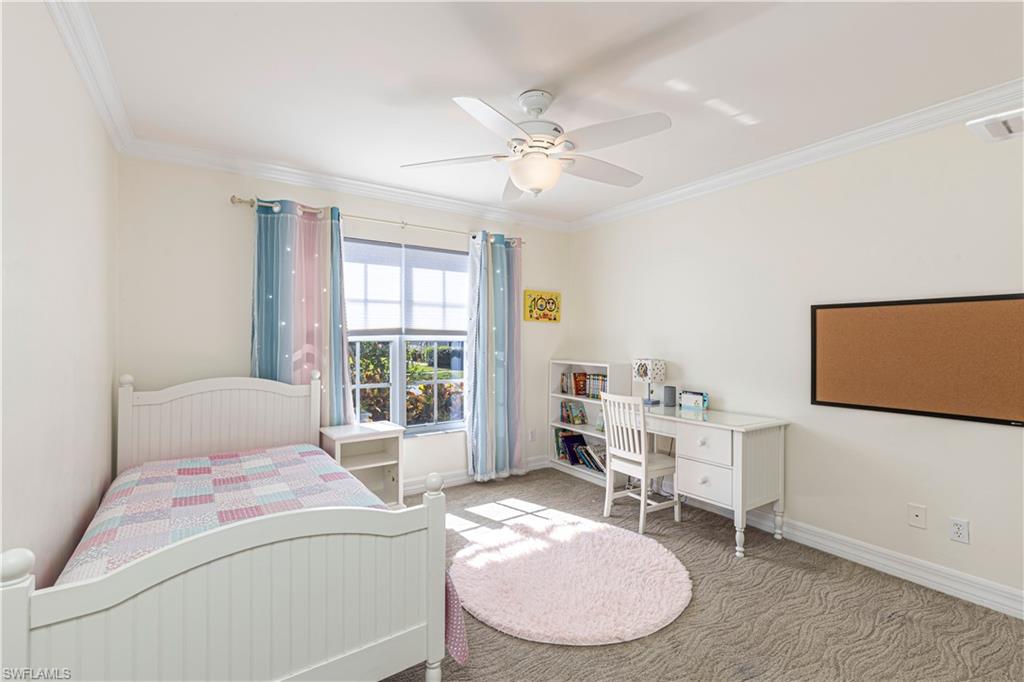 1767 Ribbon Fan Lane Naples, FL 34119 - Photo 13 of 31 Carpeted bedroom featuring ceiling fan and crown molding