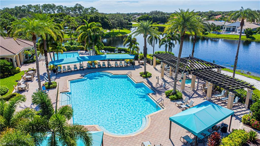 1767 Ribbon Fan Lane Naples, FL 34119 - Photo 20 of 31 View of pool with a gazebo, a water view, and a patio