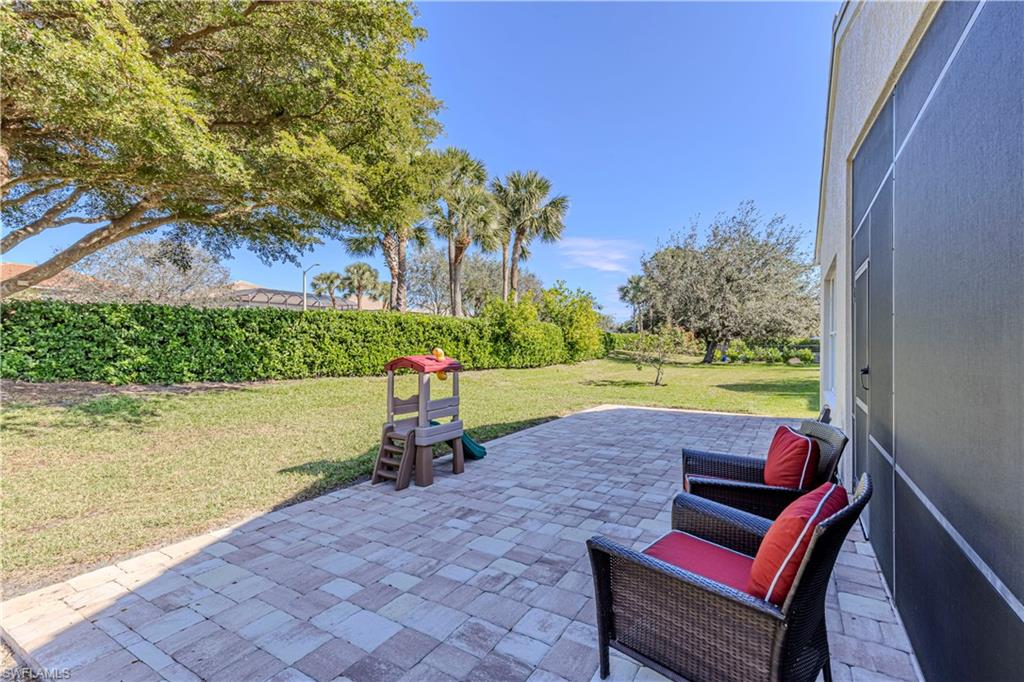 1767 Ribbon Fan Lane Naples, FL 34119 - Photo 2 of 31 View of patio / terrace