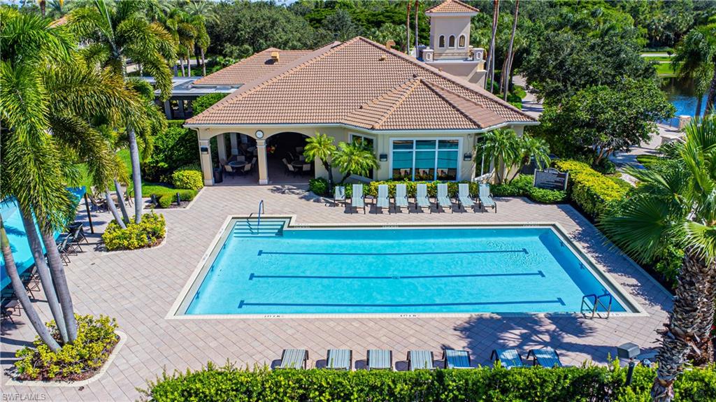 1767 Ribbon Fan Lane Naples, FL 34119 - Photo 21 of 31 View of pool with a patio