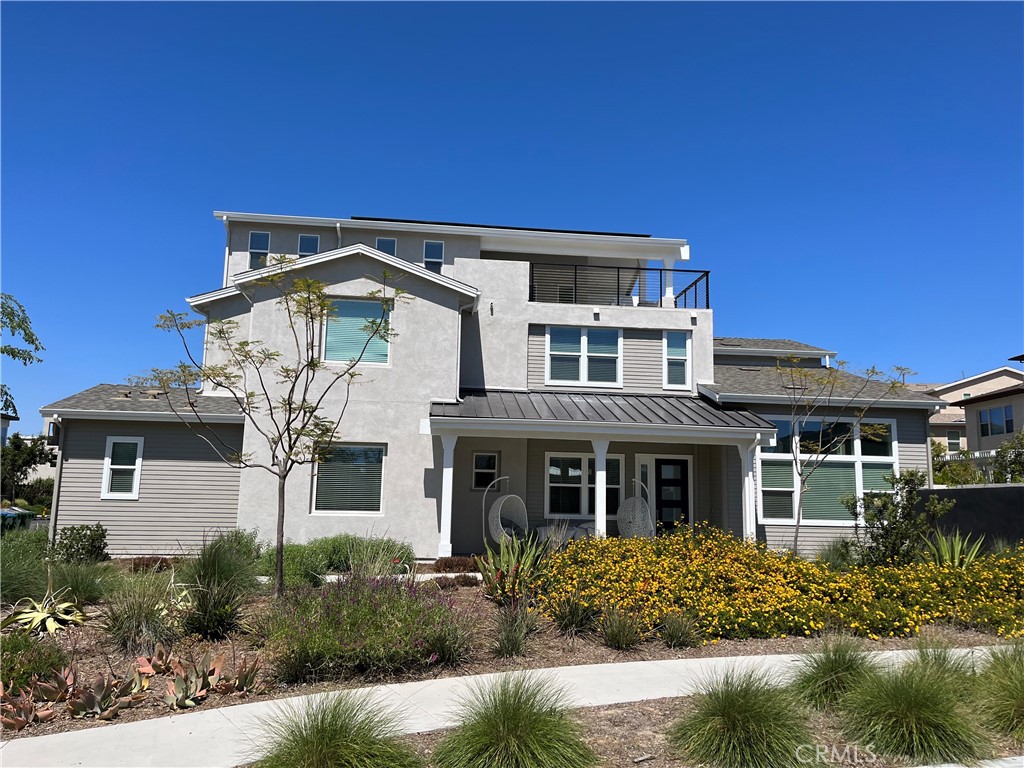 front view of house with a small yard
