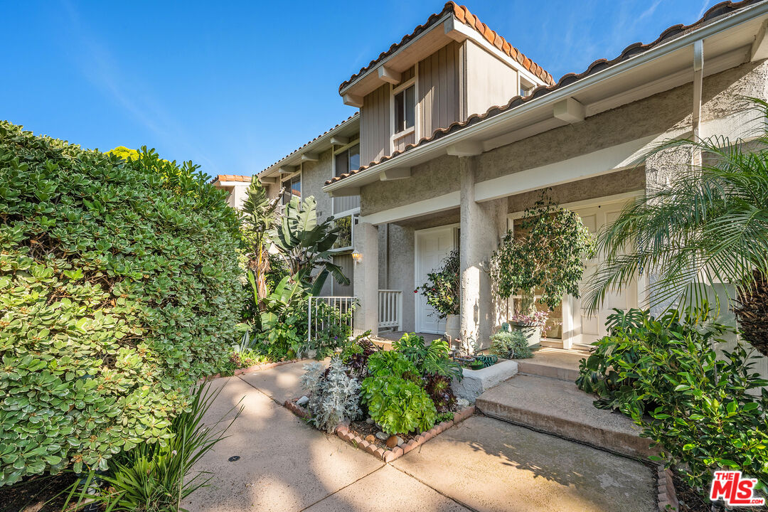28378 Rey De Copas Lane Malibu, CA 90265 - Photo 2 of 45 a view of a house with potted plants