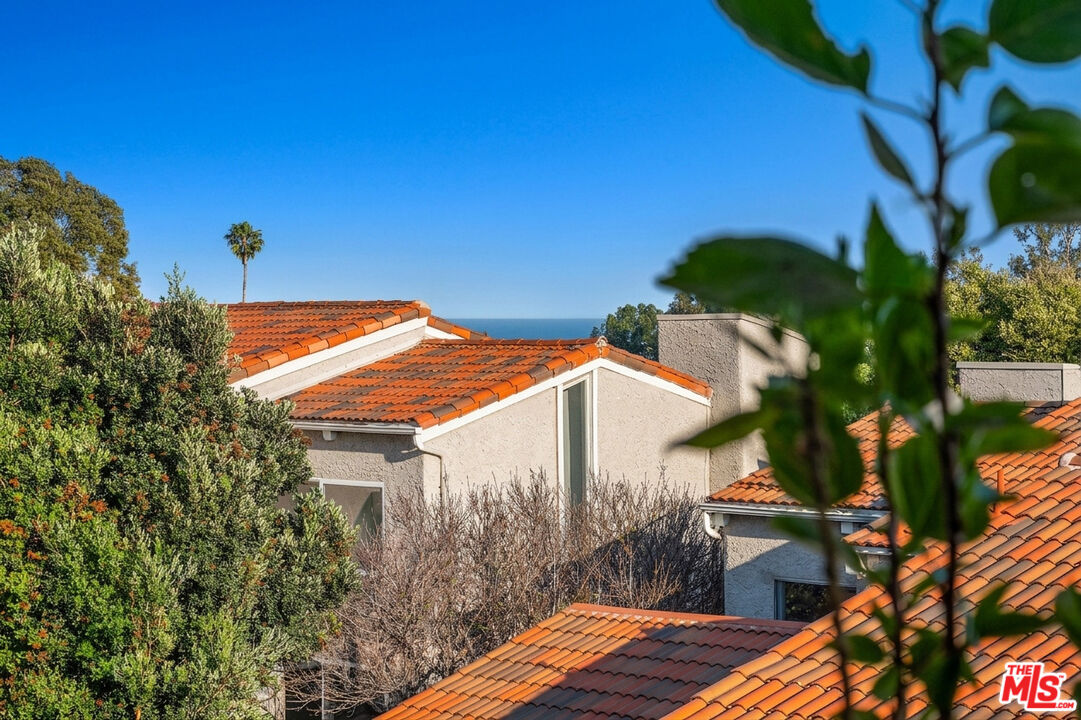 28378 Rey De Copas Lane Malibu, CA 90265 - Photo 5 of 45 a backyard of a house with seating space