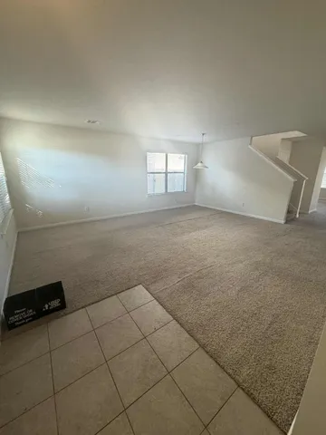 an empty room with a bench