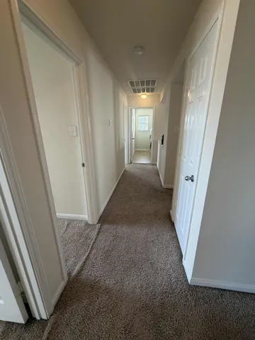 a view of a backyard of the house