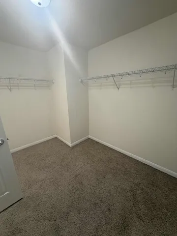 a view of a room with racks on the wall