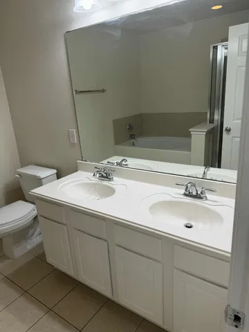a bathroom with a sink and a toilet