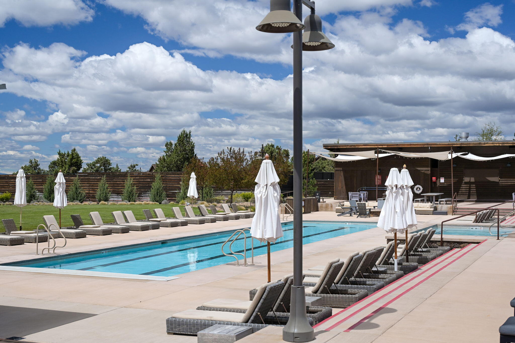 16181 South W Brasada Ranch Road, Unit 115 Powell Butte, OR 97753 - Photo 19 of 25 a view of a swimming pool with a patio