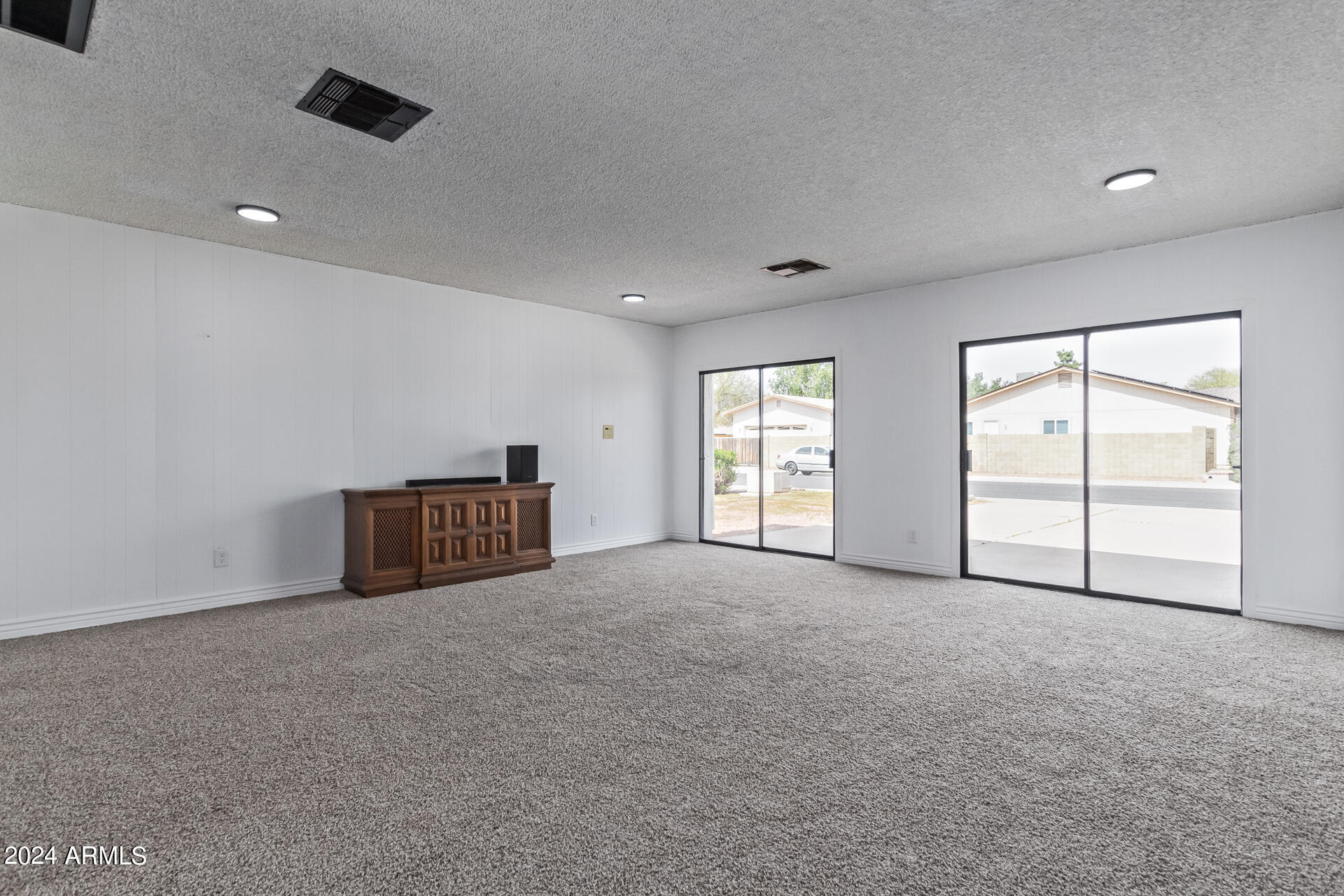 3917 West Juniper Avenue Phoenix, AZ 85053 - Photo 13 of 44 an empty room with windows