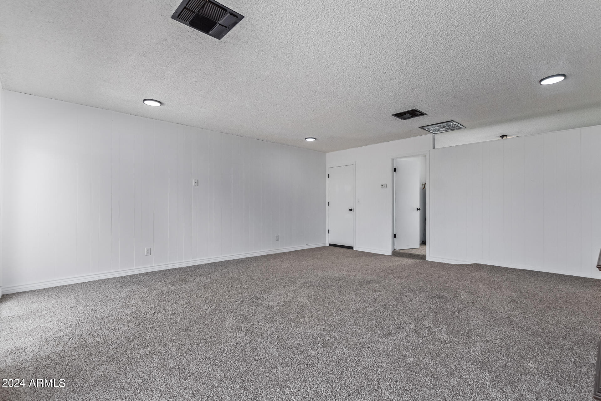 3917 West Juniper Avenue Phoenix, AZ 85053 - Photo 15 of 44 a view of an empty room