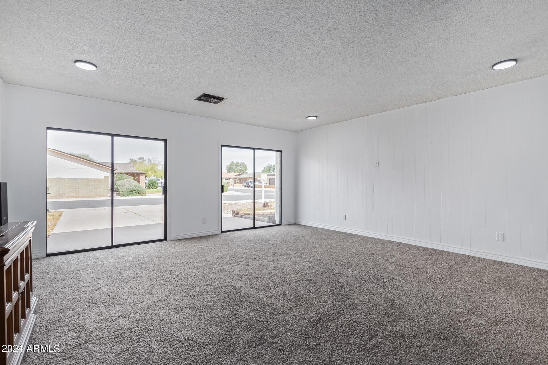 3917 West Juniper Avenue Phoenix, AZ 85053 - Photo 16 of 44 an empty room with windows