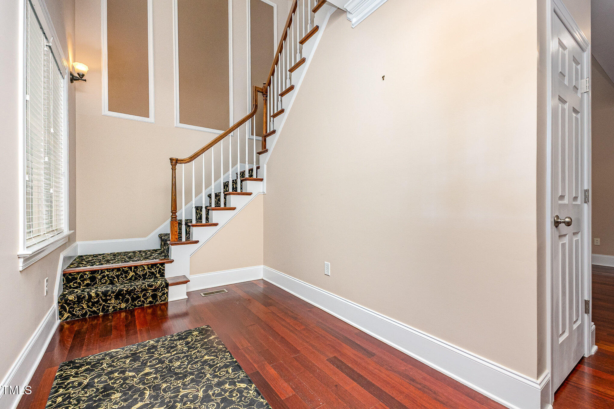 2201 Karns Place Raleigh, NC 27614 - Photo 3 of 31 a view of entryway with wooden floor