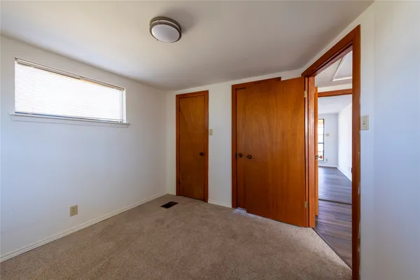 an empty room with window