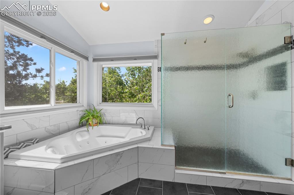 17815 Saddlewood Road Monument, CO 80132 - Photo 23 of 40 a bath tub sitting next to a window