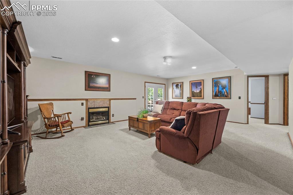 17815 Saddlewood Road Monument, CO 80132 - Photo 29 of 40 a living room with furniture