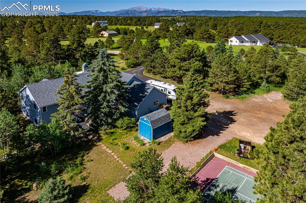17815 Saddlewood Road Monument, CO 80132 - Photo 6 of 40 an aerial view of a house with a yard