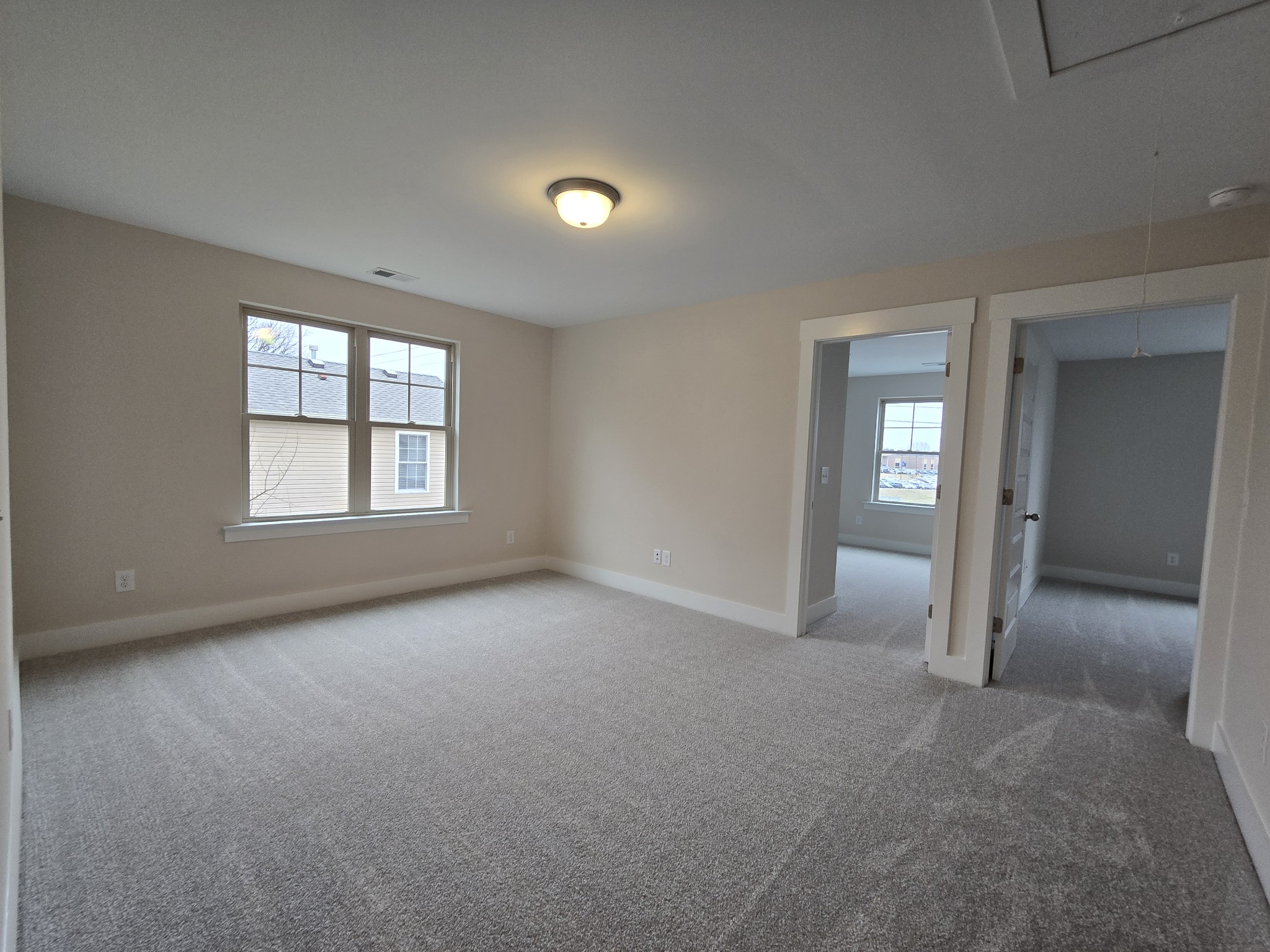 324 Chaney Road, Unit 5 Smyrna, TN 37167 - Photo 17 of 19 an empty room with windows and entrance