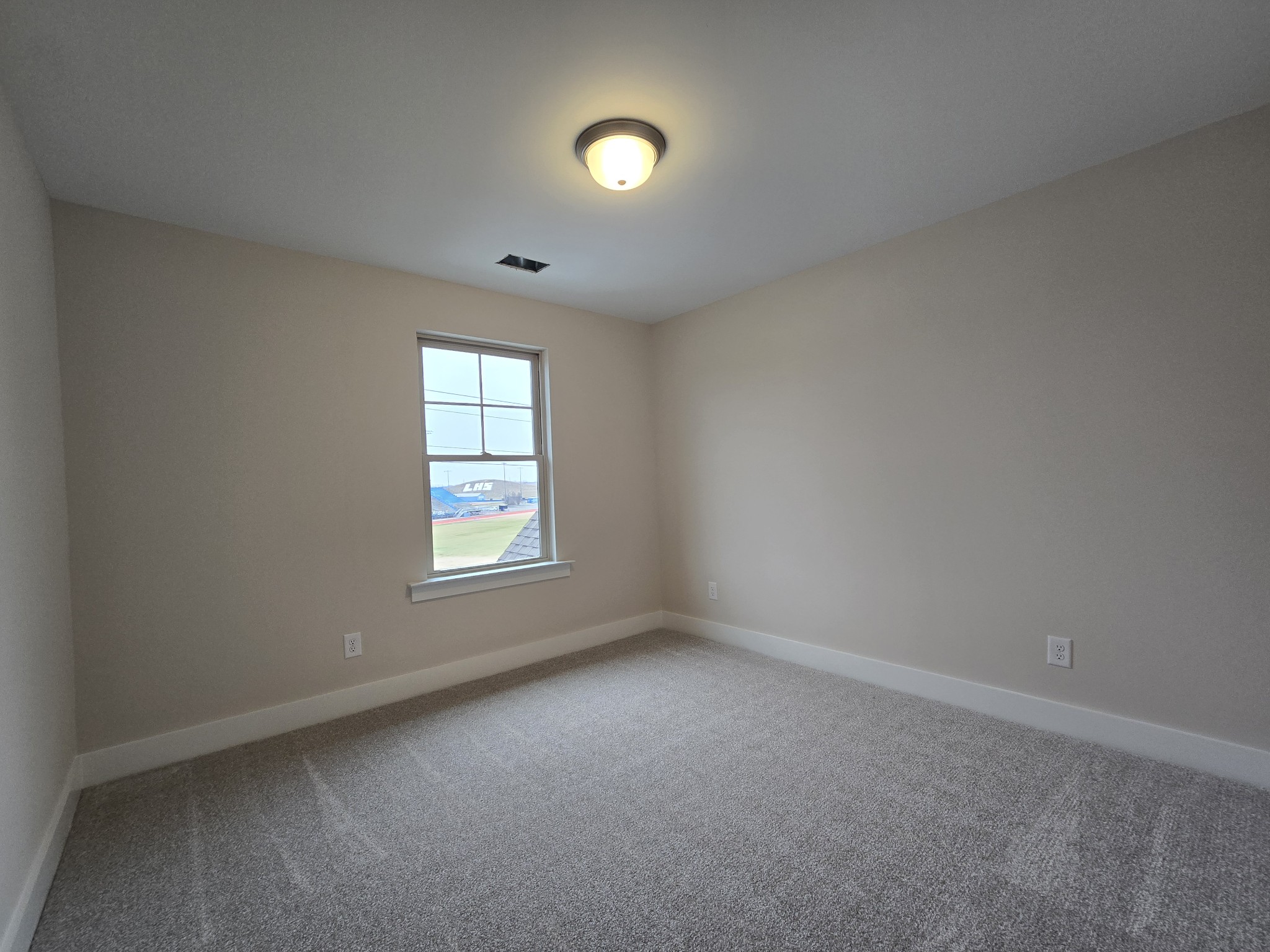 324 Chaney Road, Unit 5 Smyrna, TN 37167 - Photo 18 of 19 an empty room with a window and closet area