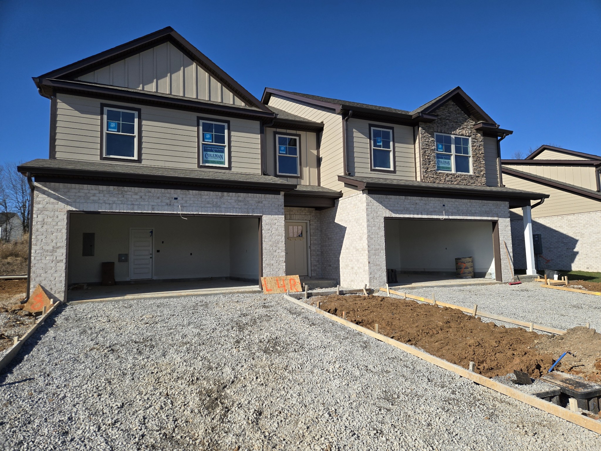 324 Chaney Road, Unit 5 Smyrna, TN 37167 - Photo 8 of 19 a front view of a house with yard and parking space