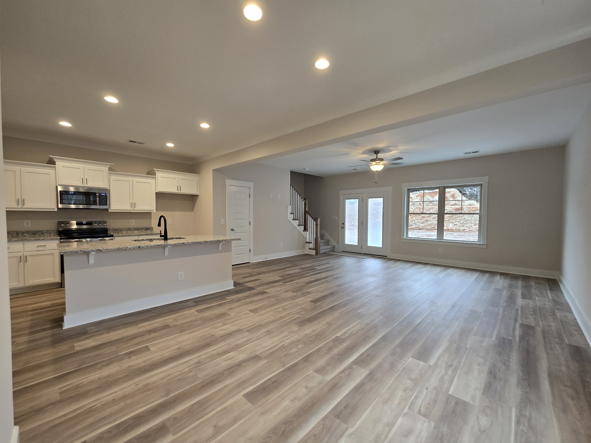 324 Chaney Road, Unit 5 Smyrna, TN 37167 - Photo 10 of 19 a view of kitchen with cabinets and wooden floor