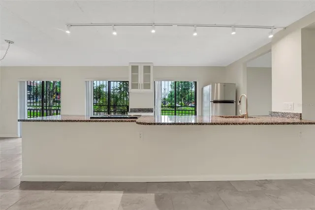 $192,500 | 208 North Lake Howard Drive, Unit 104, Winter Haven, FL 33881