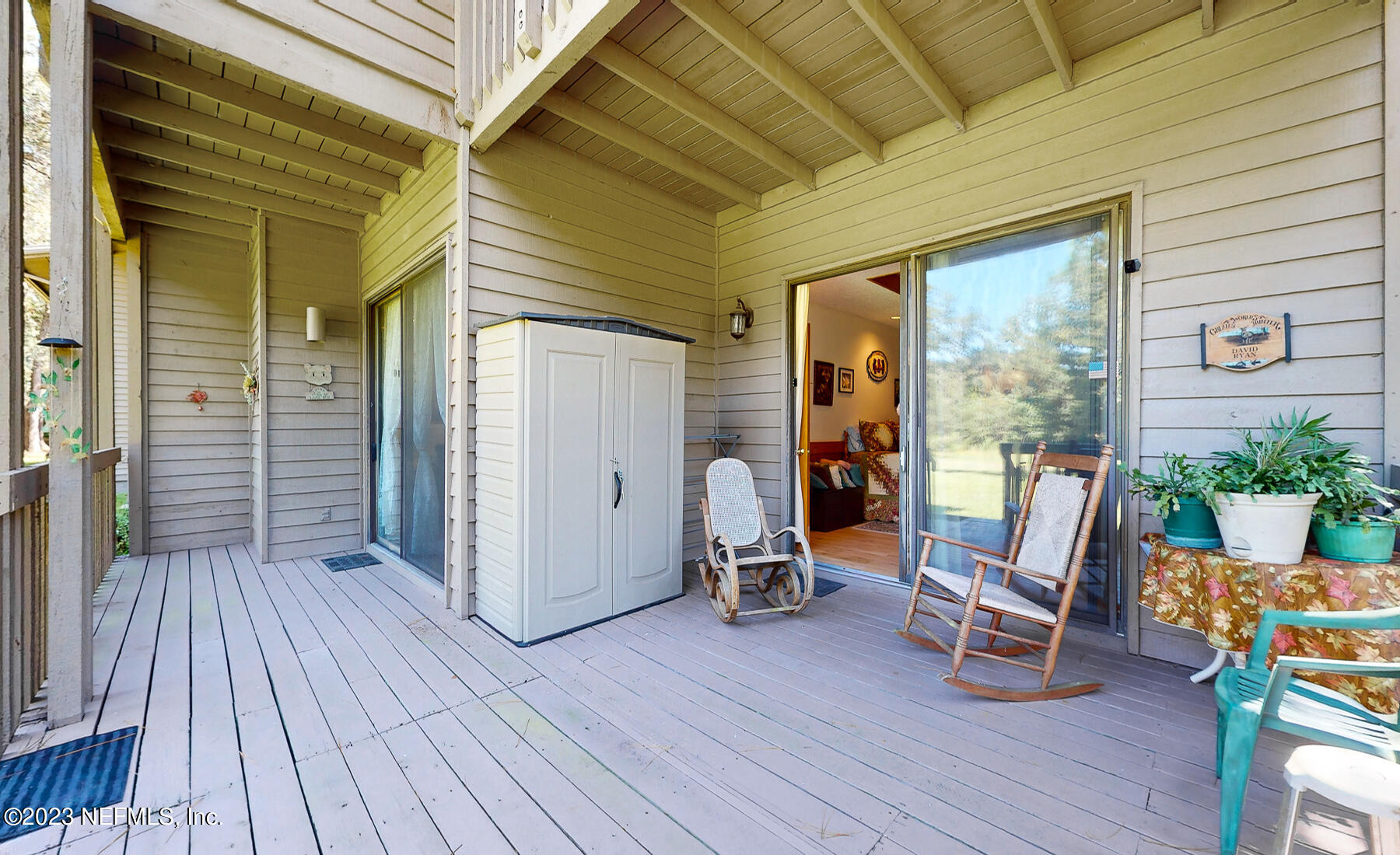 2910 Ravines Road, Unit 1102 Middleburg, FL 32068 - Photo 1 of 43 a view of a two chairs in the balcony