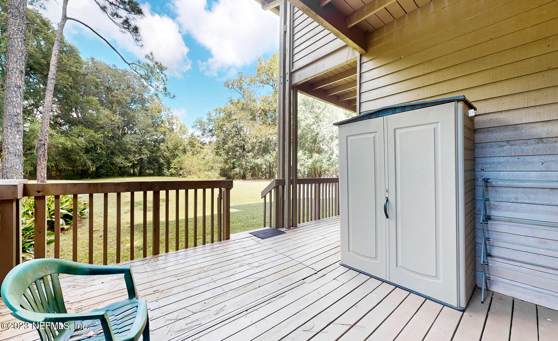 2910 Ravines Road, Unit 1102 Middleburg, FL 32068 - Photo 23 of 43 a view of a wooden deck