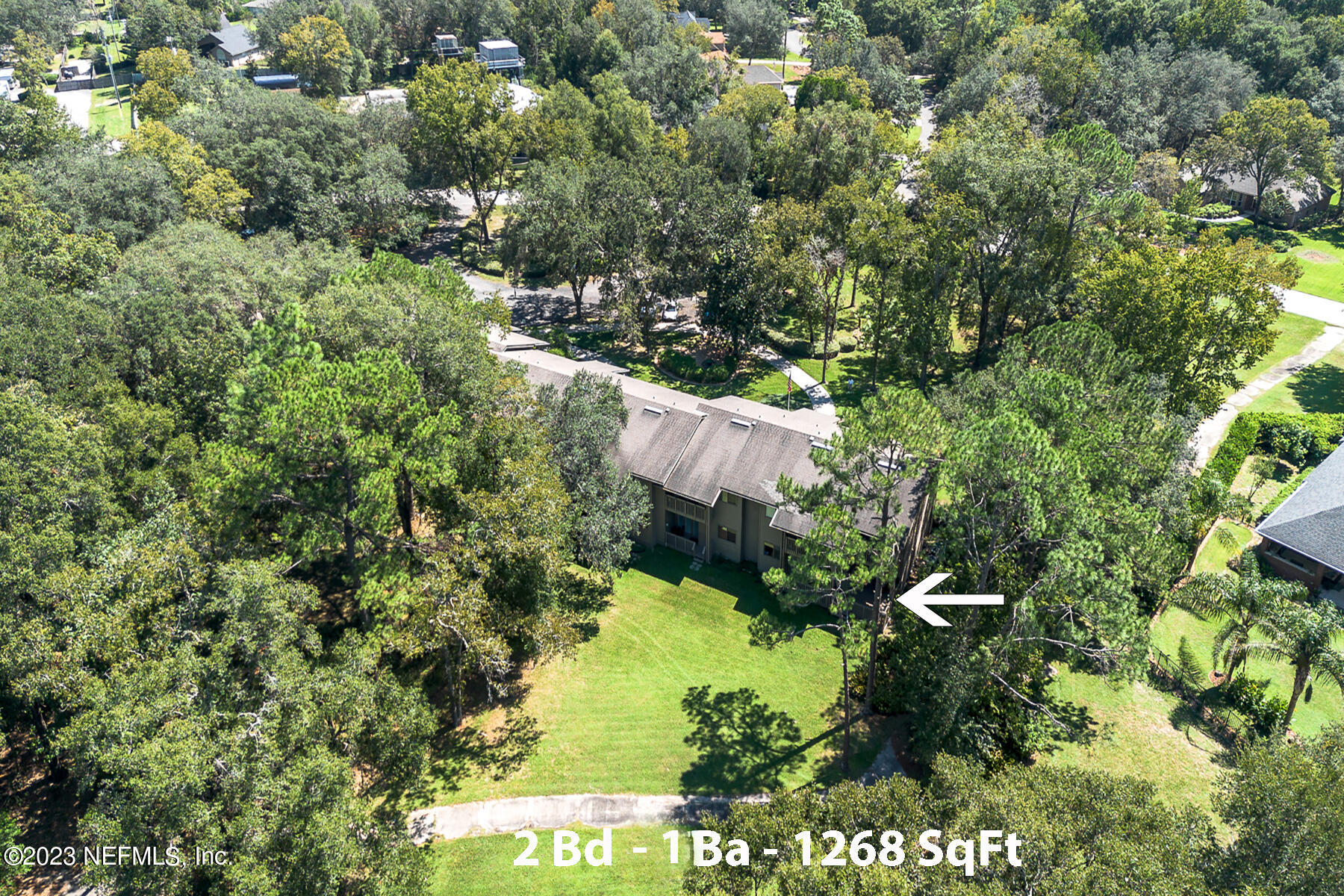 2910 Ravines Road, Unit 1102 Middleburg, FL 32068 - Photo 34 of 43 a view of a house in a forest