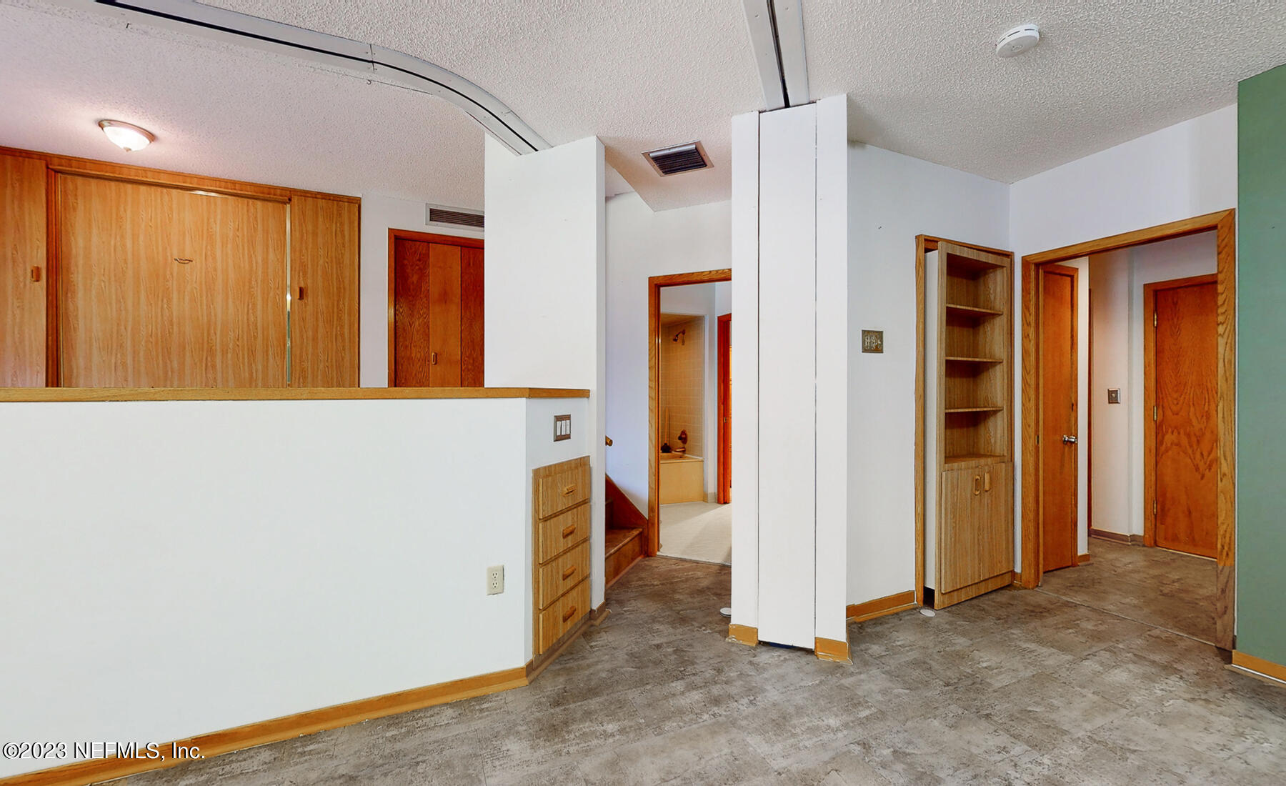 2910 Ravines Road, Unit 1102 Middleburg, FL 32068 - Photo 7 of 43 a view of a hallway with closet