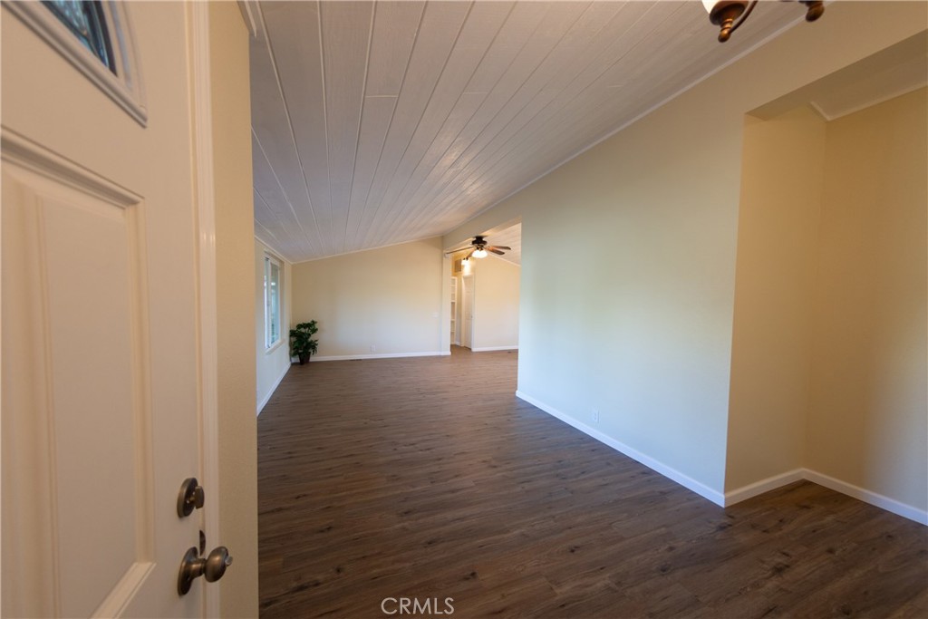 655 Nelson Avenue Oroville, CA 95965 - Photo 16 of 51 Front door opens to living room on the left and hallway to the right leads to the west side bedrooms
