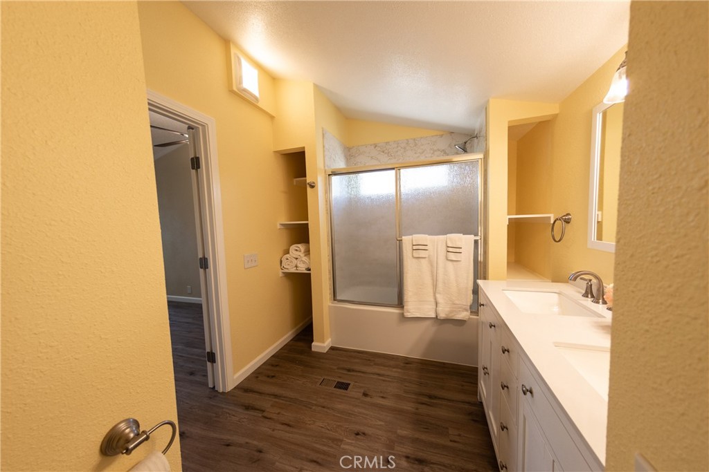 655 Nelson Avenue Oroville, CA 95965 - Photo 28 of 51 Sunshine yellow bathroom is on the east side of the home