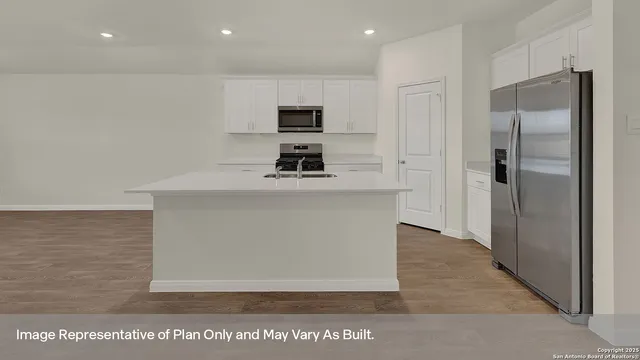 a view of a kitchen with a sink
