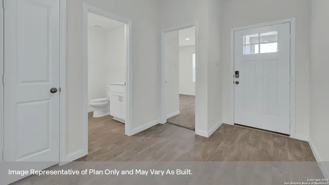 a view of a bathroom with a hardwood floor and a sink