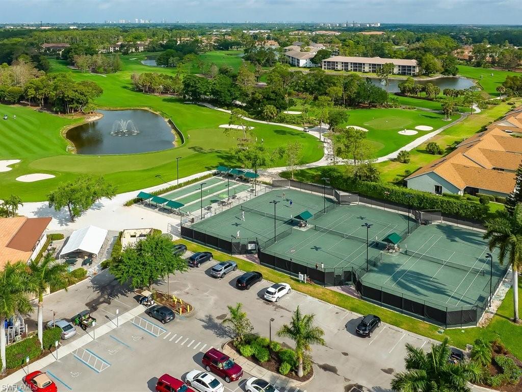 360 Fox Den Circle Naples, FL 34104 - Photo 30 of 41 an aerial view of a house with a garden