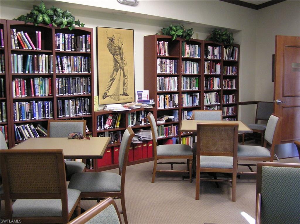 360 Fox Den Circle Naples, FL 34104 - Photo 34 of 41 a view of a workspace with furniture and toys