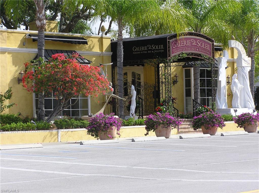 360 Fox Den Circle Naples, FL 34104 - Photo 37 of 41 a front view of a house