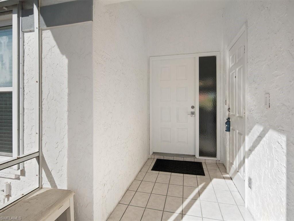 360 Fox Den Circle Naples, FL 34104 - Photo 6 of 41 a view of an empty room