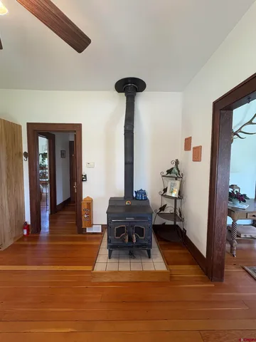 a view of workspace with furniture and wooden floor