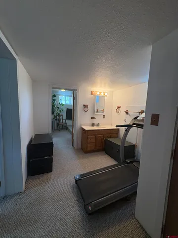 a room with lots of different colored cloths