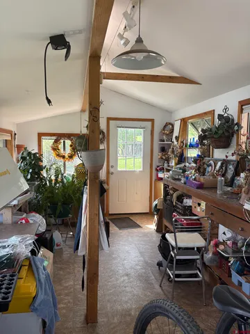 a view of parking garage with cars park