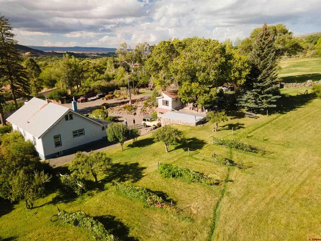 a view of a town with mountains in the background