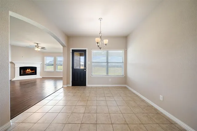 a view of a kitchen with a sink and a window