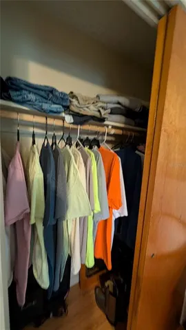a close up view of a walk in closet