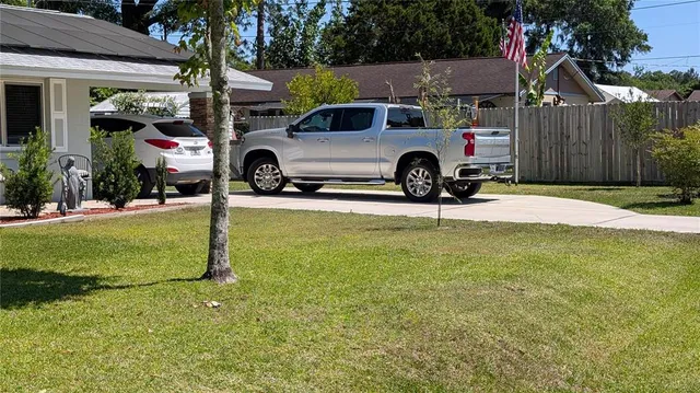a house view with a garden space
