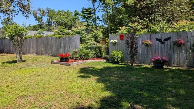 a view of a backyard of the house