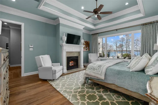 a bedroom with furniture and a fireplace