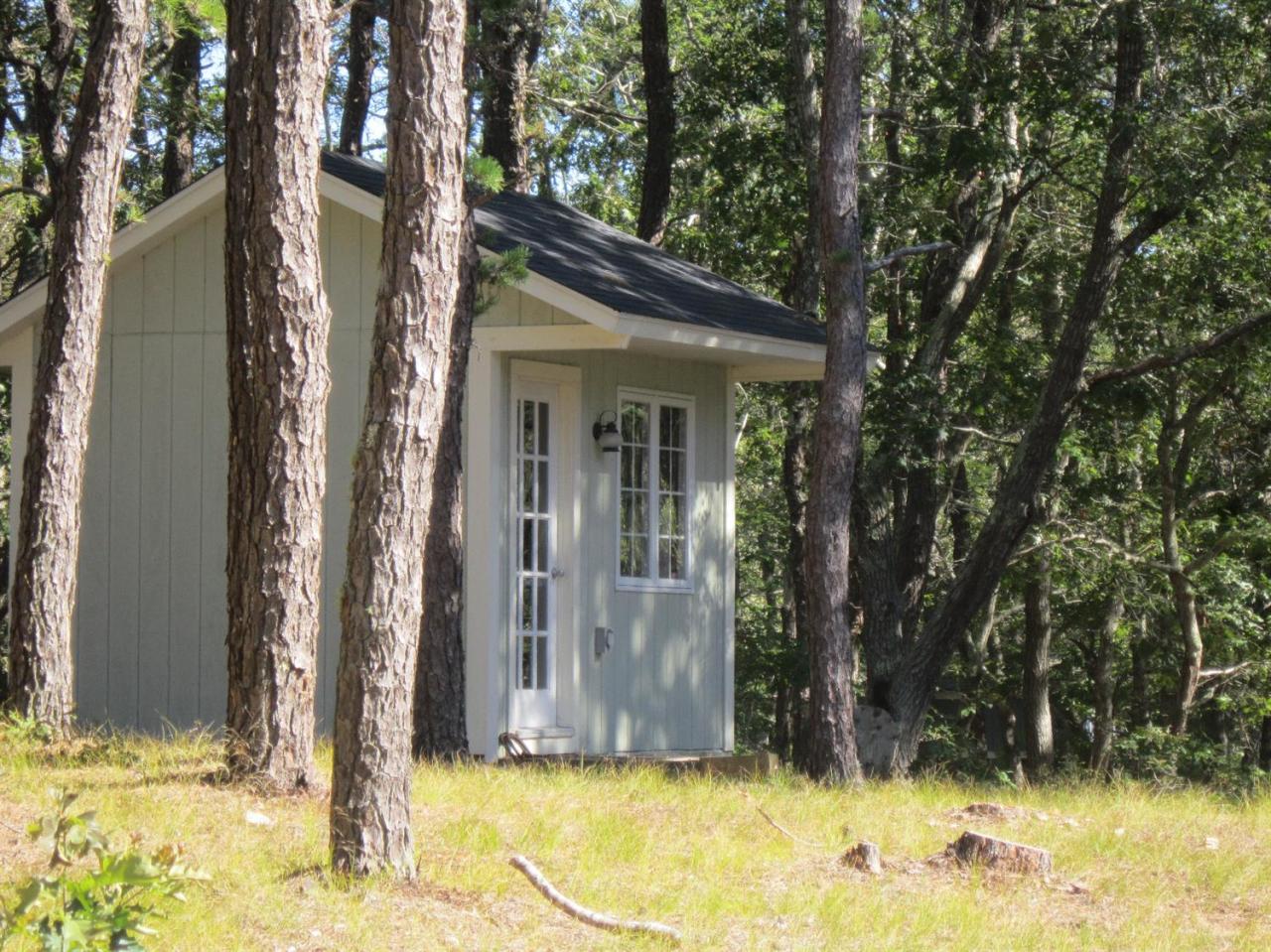 30 Bartlett Road Wellfleet, MA 02667 - Photo 4 of 12 a view of a house with a small yard