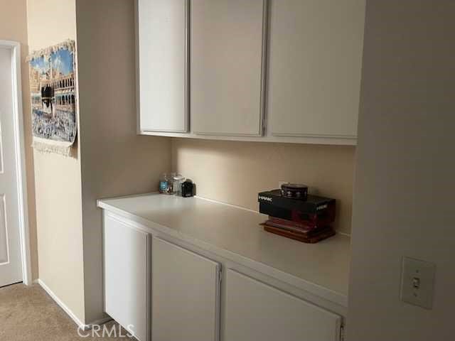 412 Yellowstone Circle Corona, CA 92879 - Photo 15 of 15 a kitchen with a sink and cabinets