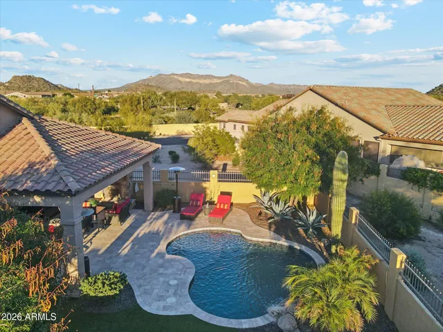 a view of a backyard with a patio